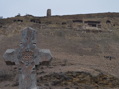 Close-up of a grave stone in front of a Georgian monastery