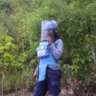 Cristina, a female deminer wears PPE in Angolan minefield