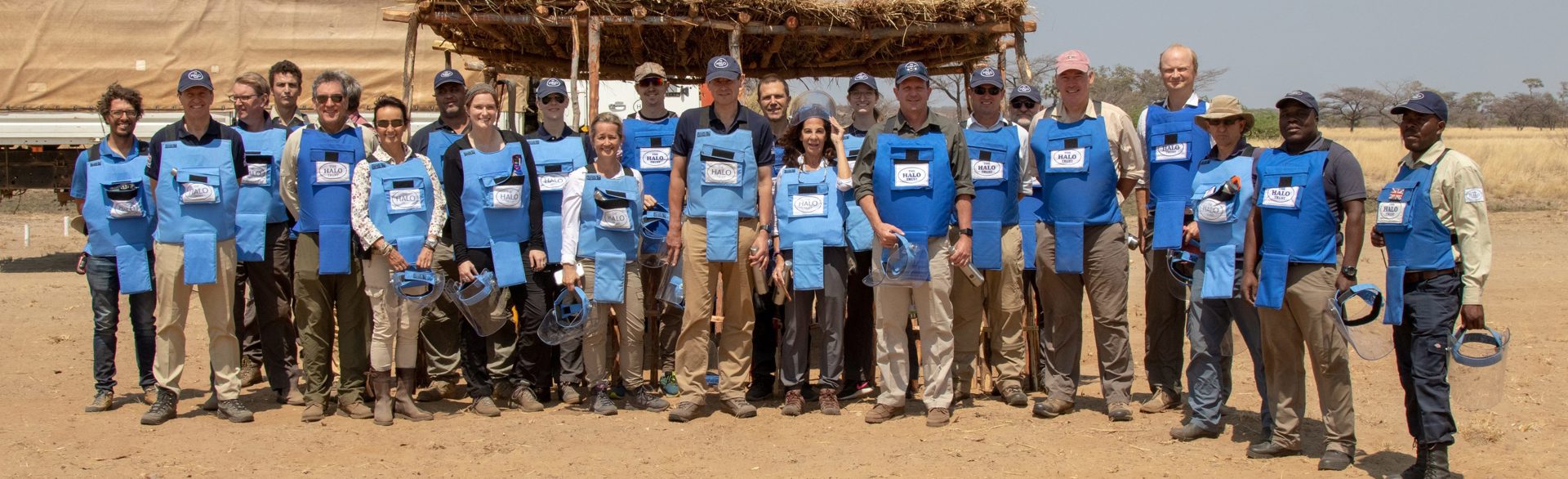 Group of HALO staff, guests and trustees in Angola 