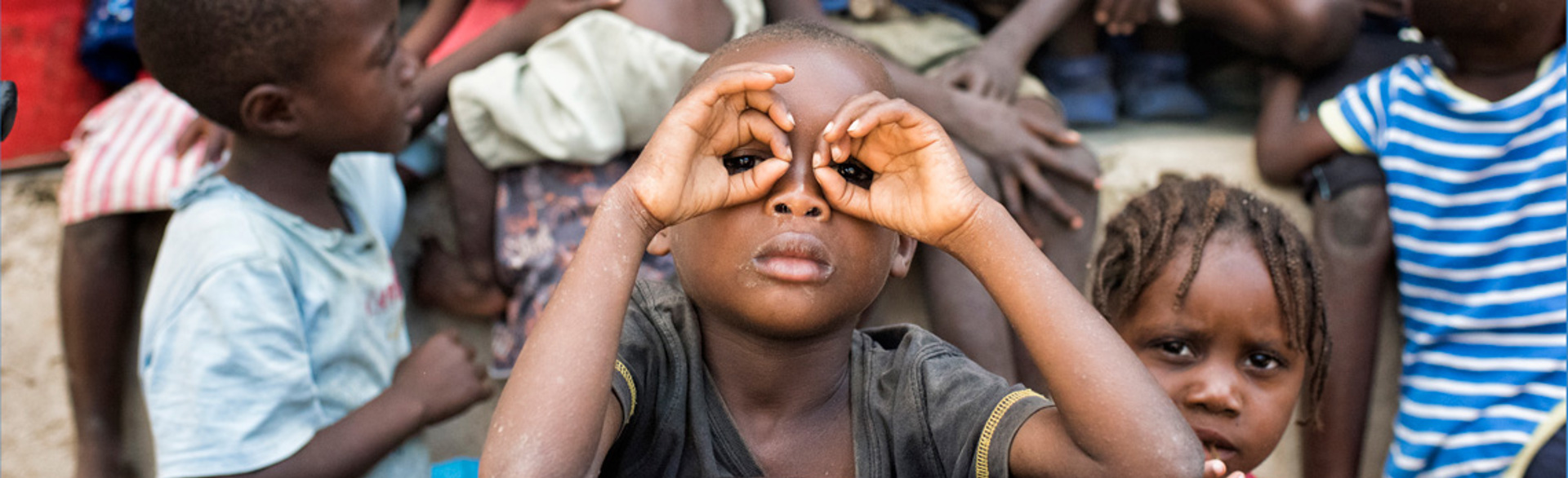 A group of children playing together in Angola