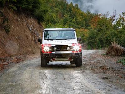 The Grenadier 4x4 is put through its paces as it drives down a Kosovo road