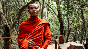 A monk leading the Community Forest project